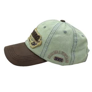 Detail showing American style letter embroidery on a washed vintage baseball cap