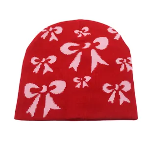 Bonnet en tricot rouge avec motif jacquard à nœuds roses pour la chaleur et le style