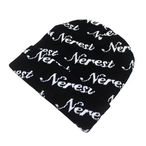 Black knitted beanie featuring white Nerest jacquard patterns for winter warmth