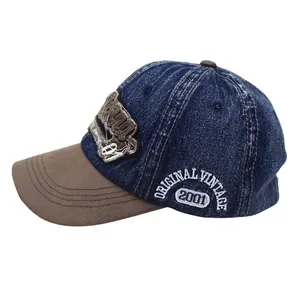 Detailed side view of vintage washed denim baseball cap with American style embroidery