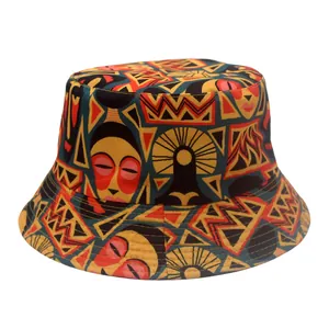 Detail of tribal pattern bucket hat with ethnic mask prints and geometric motifs