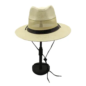Detail of breathable mesh weave straw fedora with brown faux leather band and wind strap