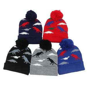 Bonnet en Tricot pour Enfants en Acrylique Hiver Chaud avec Pompon Design Jacquard Dinosaure pour Garçons Filles Bonnet Thermique Doux en Tricot Extérieur