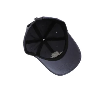 Internal view of dark blue baseball cap showing six-panel stitching and inner lining detail