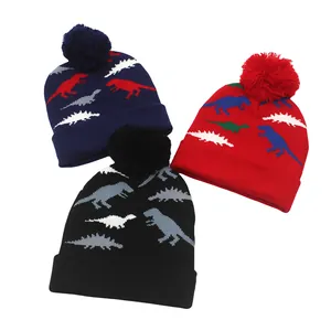 Bonnets tricotés enfants avec jacquard dinosaure et pompon en bleu marine rouge et noir