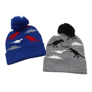 Bonnets tricotés pour enfants avec dinosaures et pompons en bleu royal et gris hiver