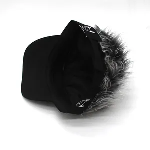 Detailed view of novelty baseball cap featuring faux hair wig and cat embroidery