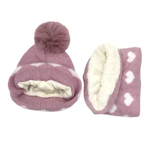 Pink heart pattern kids knit hat and scarf set with thick fleece lining and faux fur pom