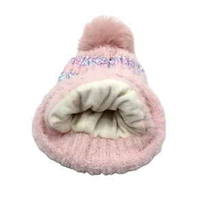 Bonnet d'hiver en peluche rose pour enfants avec pompon et doublure polaire chaude