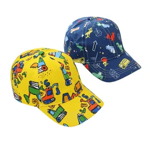 Detail of cartoon excavator and vehicle print on yellow and navy kids baseball caps