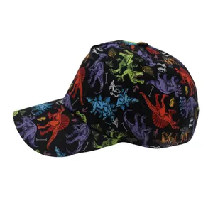 Detail of children's black baseball cap featuring vibrant colorful dinosaur print patterns