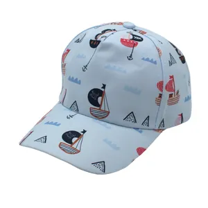 Close-up of children baseball cap showing nautical pirate ship prints and twill fabric texture