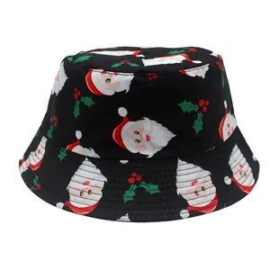 Close-up detail of the Santa Claus and holly patterns on a black Christmas bucket hat