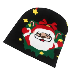 Détails du bonnet en tricot noir avec motif Père Noël et éléments décoratifs de Noël