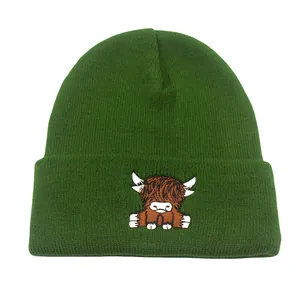Dark green knitted beanie with embroidered Highland cow, warm winter hat for men and women