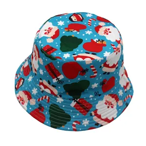 Detail of light blue Christmas bucket hat with Santa, reindeer, and snowflake prints