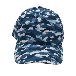 Close-up of kids baseball cap featuring blue shark camouflage patterns and durable fabric
