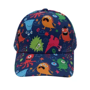Detail view of navy blue kids baseball cap featuring vibrant cartoon monster prints