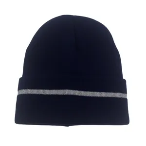 Detailed view of dark blue reflective beanie hat with a safety silver strip for night running