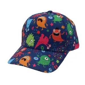 Detailed view of kids cartoon monster print baseball cap with vibrant stars on navy fabric