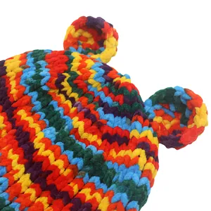 Handmade crochet beanie with bear ears in colorful rainbow striped chenille yarn