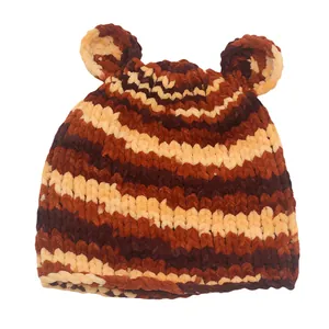 Handmade knitted winter beanie with cute bear ears and stylish brown wave stripes