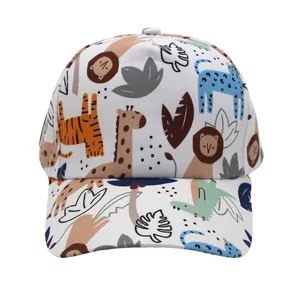 Detailed view of kids' white baseball cap with colorful cartoon animal and leaf prints