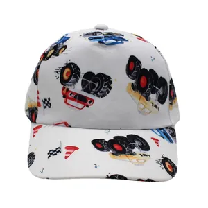 Close-up of kids baseball cap featuring colorful monster truck prints and racing patterns