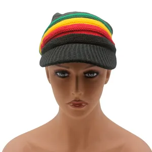 Detail of Rasta style knit beanie with green, yellow, and red stripes on a black visor hat