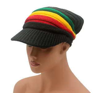Detail of Rasta style knit beanie with red, yellow, and green stripes and visor brim