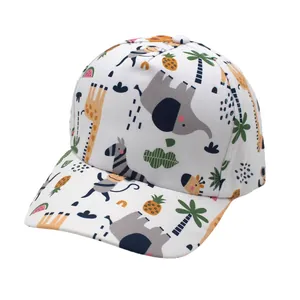 Close-up of kids baseball cap featuring vibrant tropical animals and fruit prints
