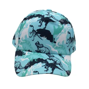 Close-up of bright blue kids baseball cap with detailed dinosaur silhouettes and sketches