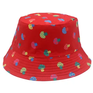 Red reversible bucket hat with colorful cartoon mushroom patterns for outdoor sun protection