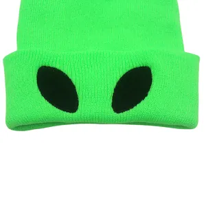 Neon green knitted beanie with alien eye embroidery for winter outdoor street style