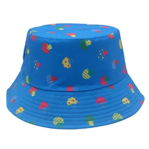 Blue reversible bucket hat featuring colorful mushroom prints for sun protection outdoors
