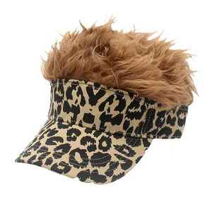 Close-up of leopard print baseball cap featuring creative brown synthetic wig hair