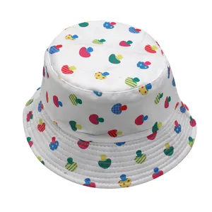 Detailed view of colorful abstract mushroom pattern on reversible white cotton bucket hat