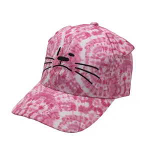 Detailed view of pink tie-dye kids baseball cap with cute cat ears and face embroidery