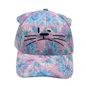 Close-up of cute cat ear design and tie-dye fabric texture on kids baseball cap