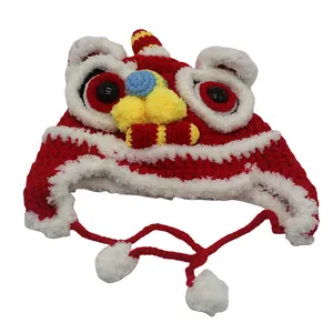 Kids knitted winter lion hat with red stripes and pompom earflaps for warmth