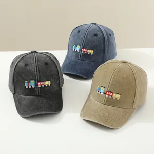 Toddler baseball caps with cartoon train embroidery in navy, grey, and khaki colors