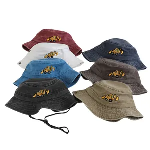 Vue détaillée de chapeaux bob pour enfants en coton avec broderie de pelle en diverses couleurs