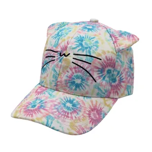 Detailed view of colorful tie-dye baseball cap featuring 3D cat ears and cat whisker embroidery