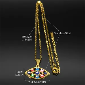 Gold stainless steel evil eye pendant necklace with colorful inlay on black background