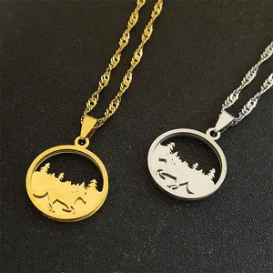 Three-layer stainless steel necklace featuring wolf and forest moon pendants in gold and silver