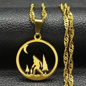 Macro shot of gold stainless steel pendant featuring Bigfoot, forest, and moon silhouette