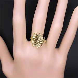 Golden Flower of Life stainless steel ring with hollow heart patterns on finger