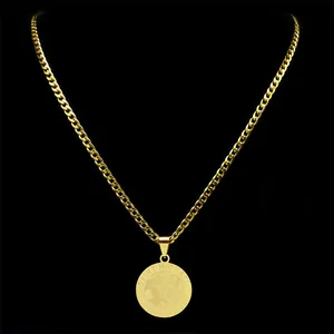 Gold Saint Michael archangel pendant necklace with polished curb chain on black background