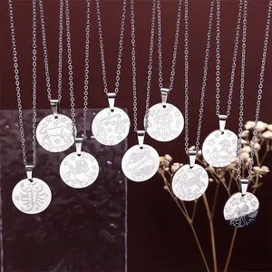 Detailed close-up of various gold zodiac constellation pendants on O-shaped chains