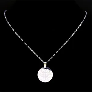 Macro view of Scorpio zodiac constellation engraved on a polished silver steel pendant